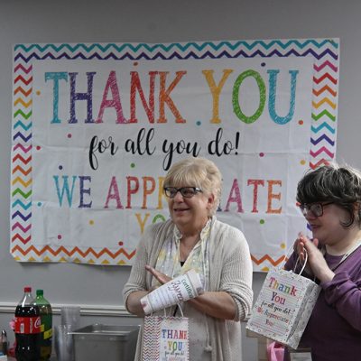 volunteers-handing-out-gifts_small